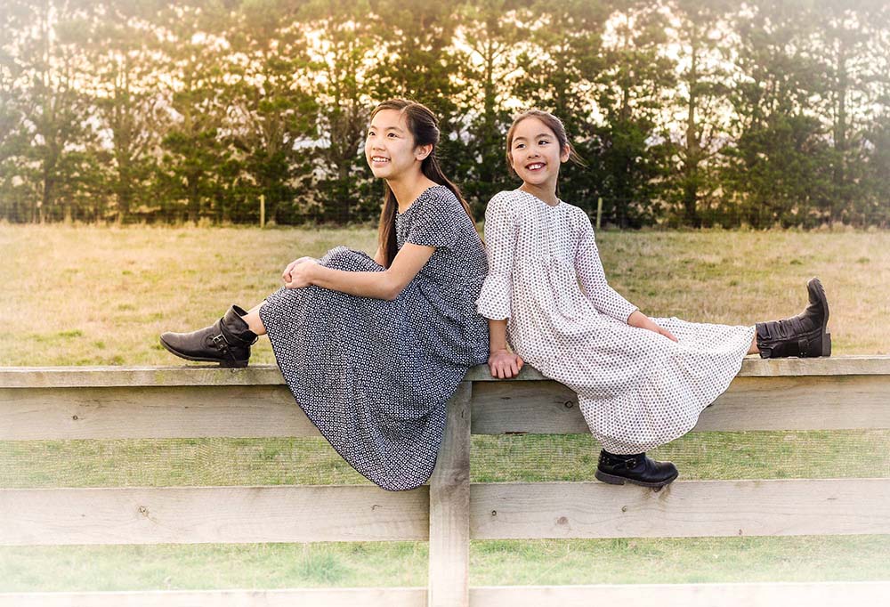 Modelled photograph of girls dresses.