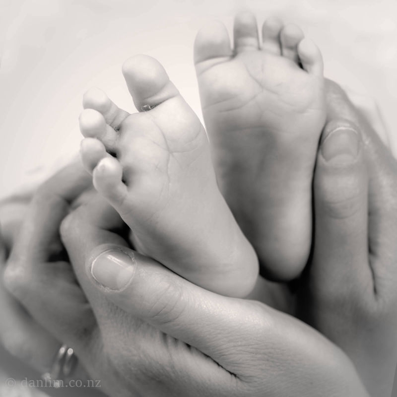 Mum and baby closeup feet and hands